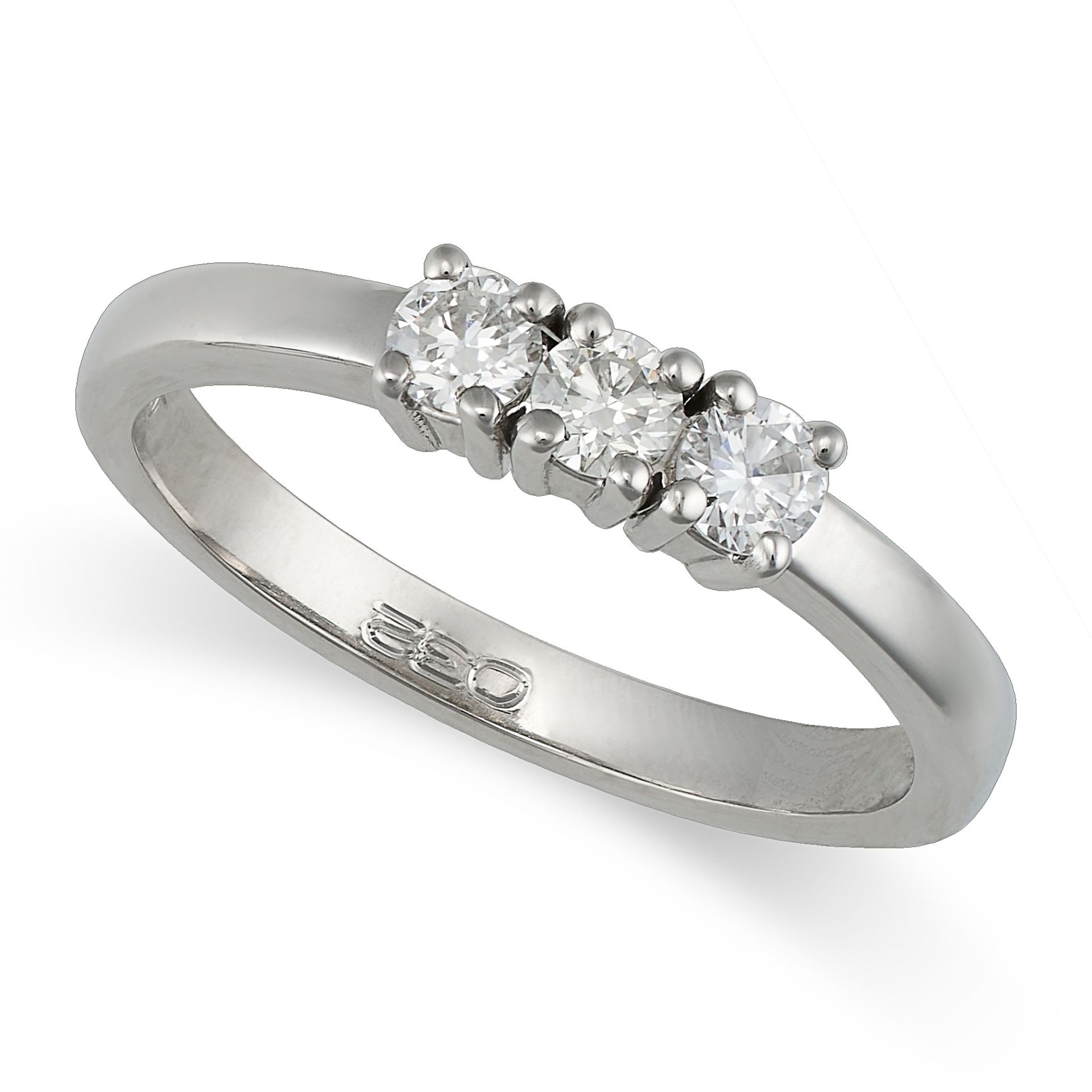 A DIAMOND THREE STONE RING in platinum, set with three round brilliant cut diamonds, full British...
