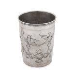 AN ANTIQUE RUSSIAN SILVER BEAKER, 19TH CENTURY the body with a chased design of birds and flowers...