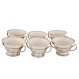 TIFFANY & CO., A SET OF SIX SILVER SOUP BOWLS with porcelain liners, each two handled bowl with a...