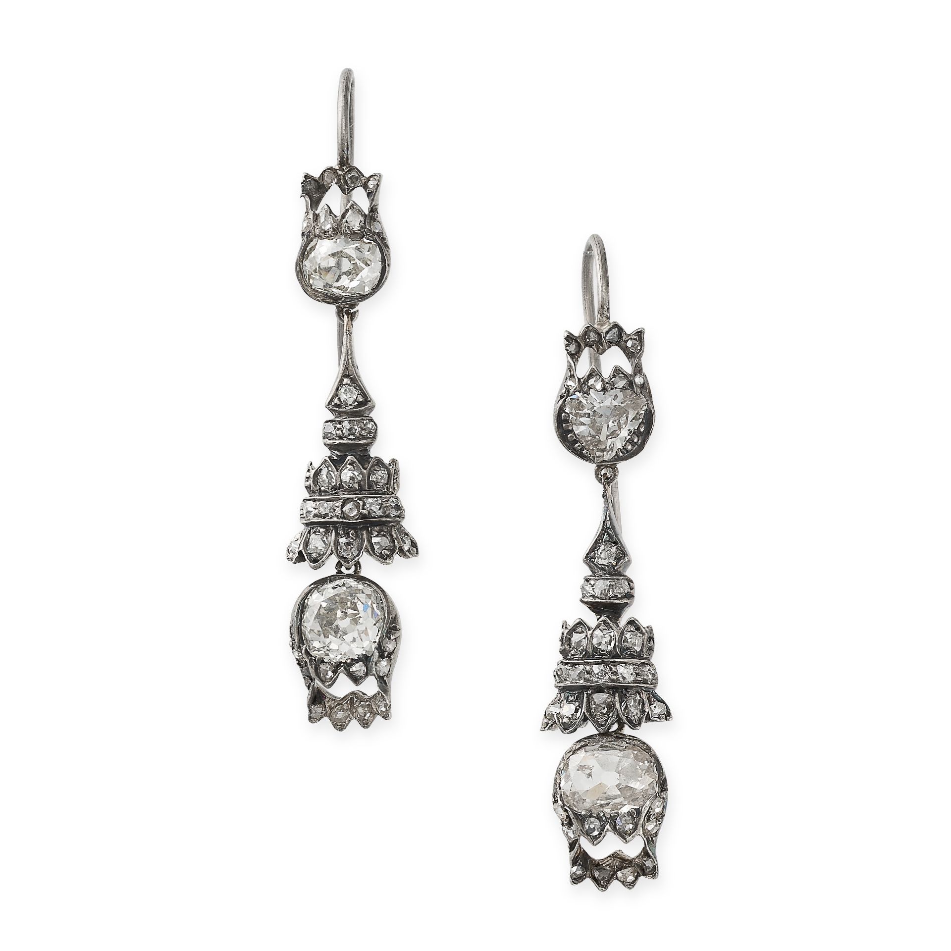 A PAIR OF ANTIQUE DIAMOND DROP EARRINGS each set with an old cut diamond accented by rose cut dia...