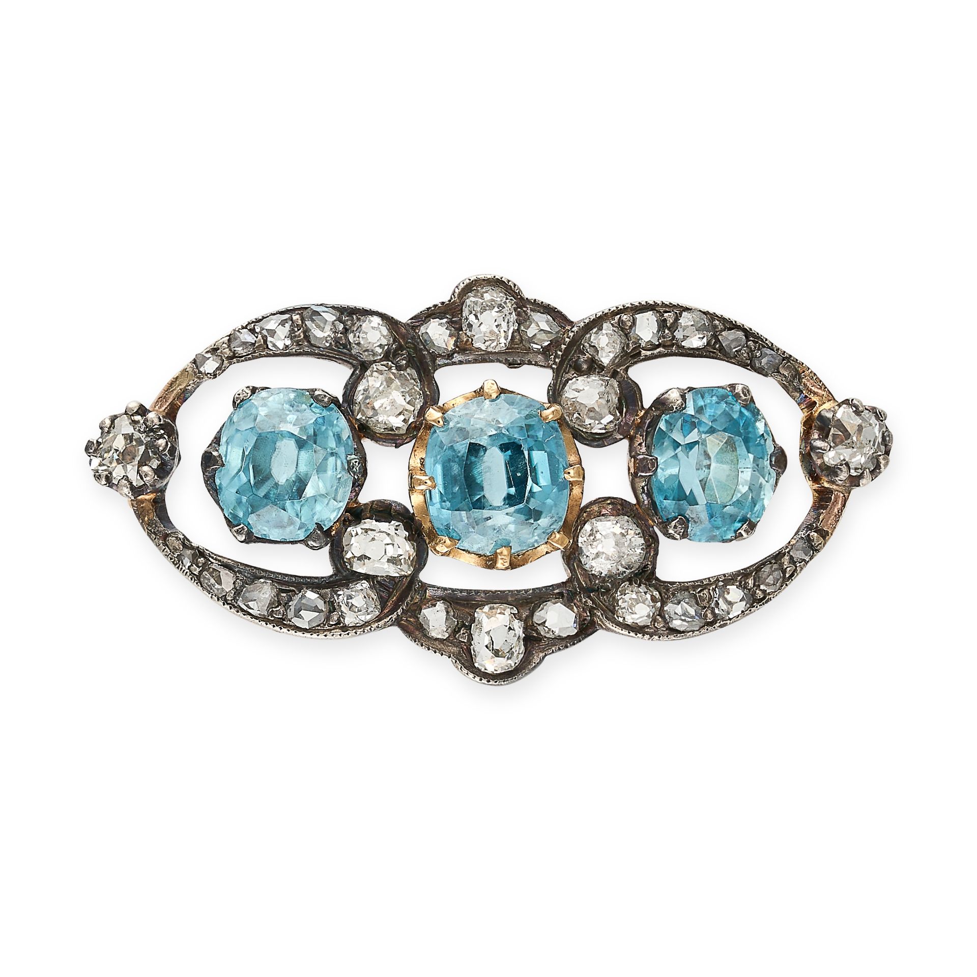 AN ANTIQUE BLUE ZIRCON AND DIAMOND BROOCH in yellow gold and silver, set with a cushion and oval ...