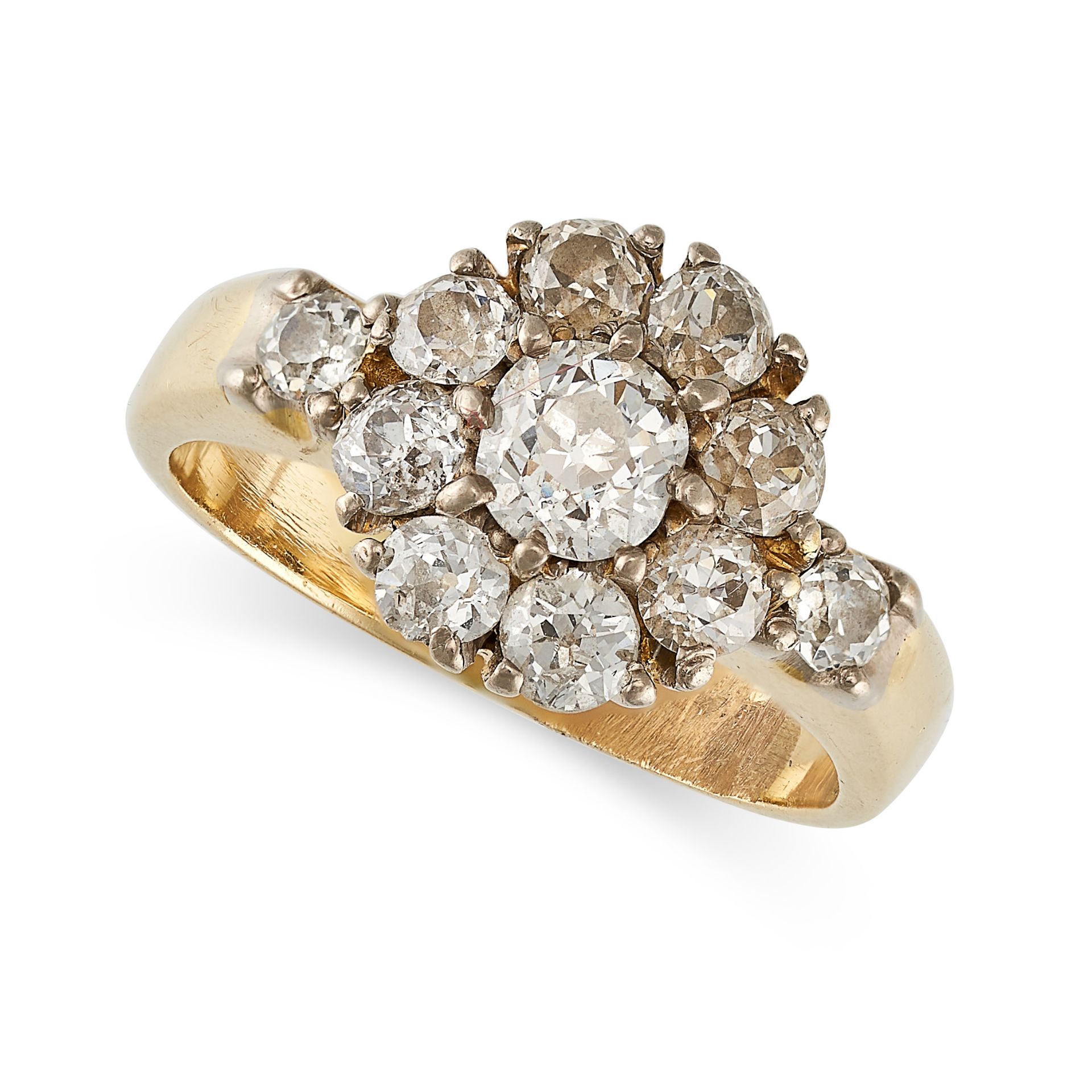 A DIAMOND CLUSTER RING in yellow gold, set with a cluster of old cut diamonds with two diamonds t...