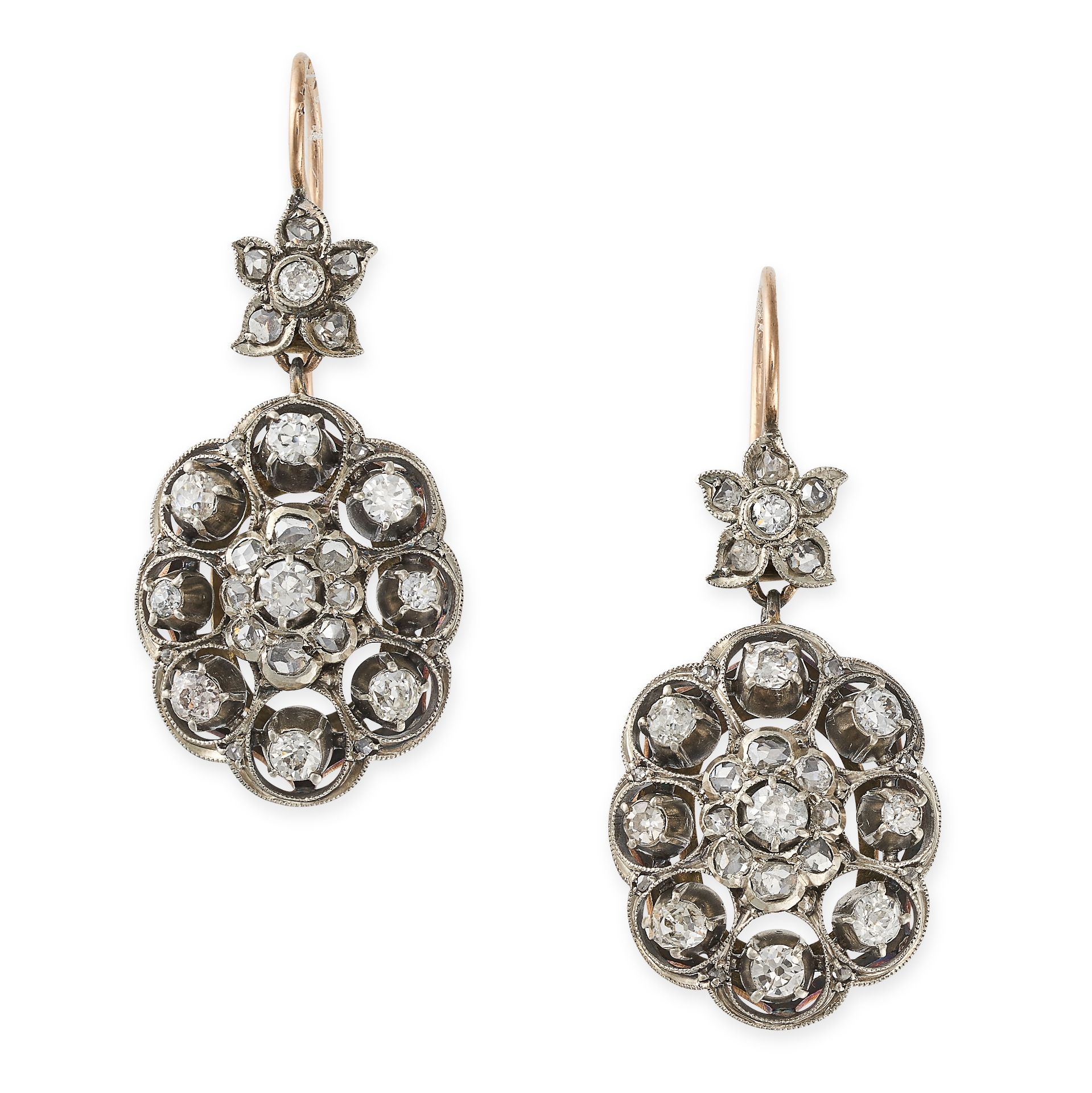 A PAIR OF ANTIQUE DIAMOND CLUSTER EARRINGS each comprising a flower set with old cut diamonds sus...