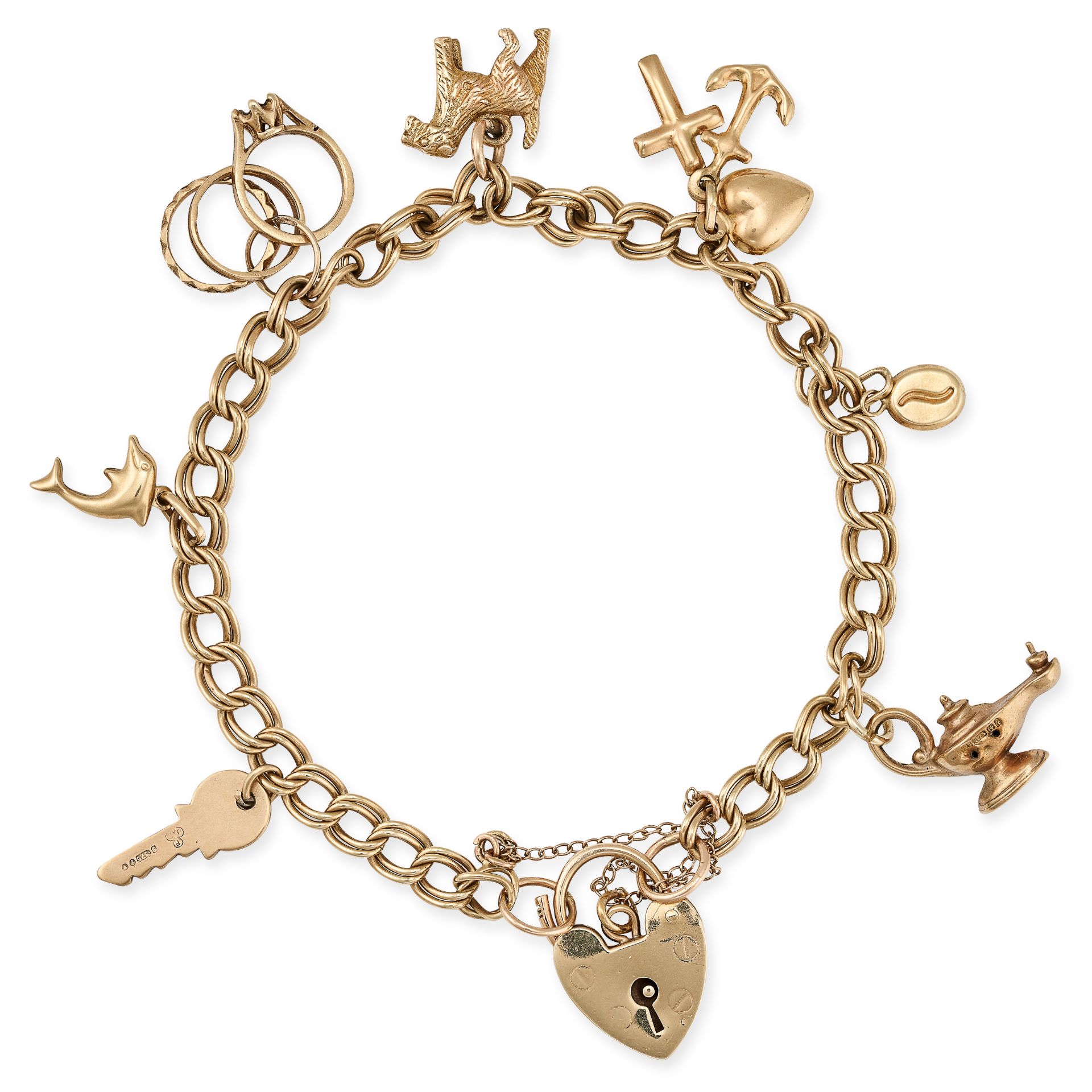 A VINTAGE CHARM BRACELET in 9ct yellow gold, the curb link chain with heart padlock clasp suspend...