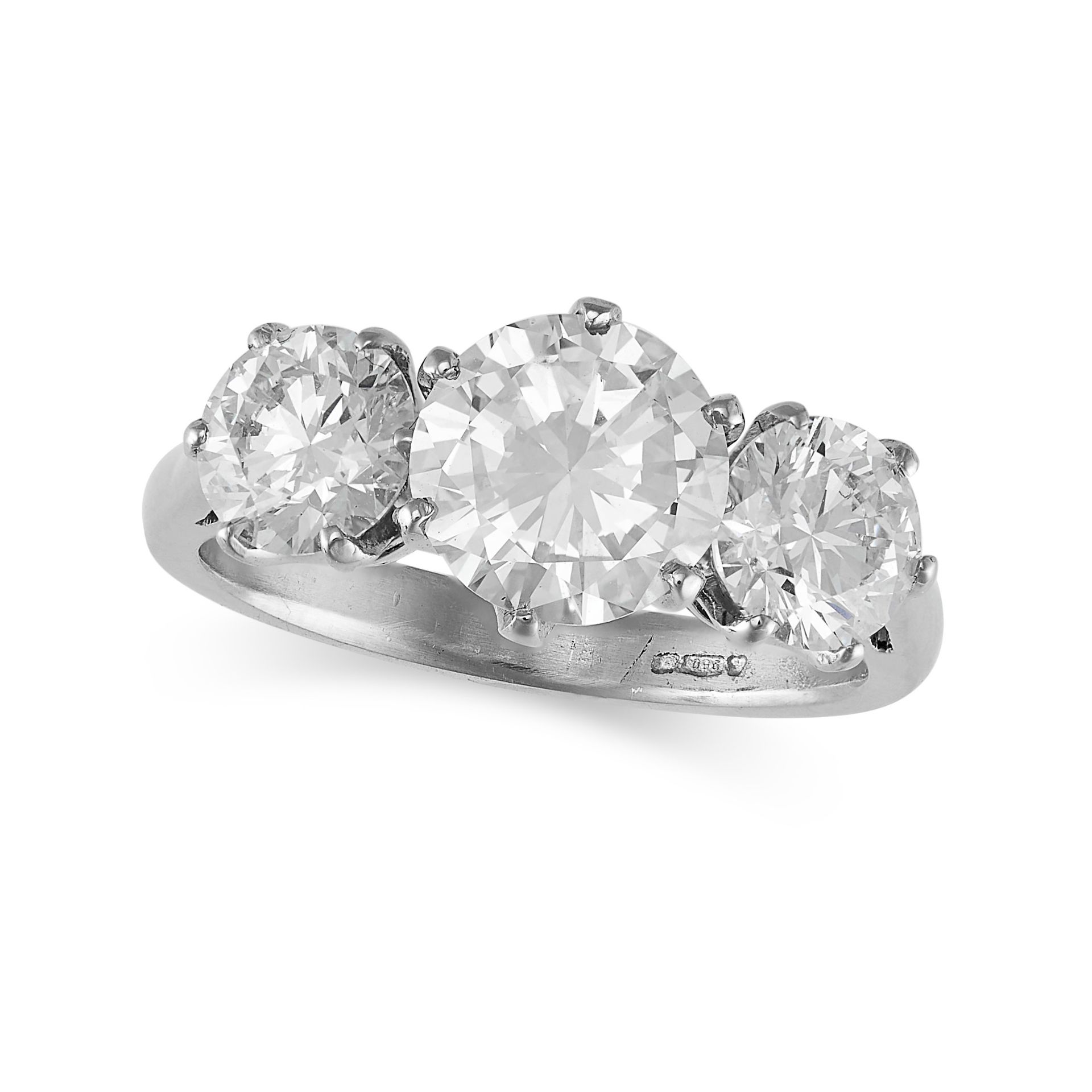 A DIAMOND THREE STONE RING in white gold, set with three round brilliant cut diamonds of 0.83, 1....