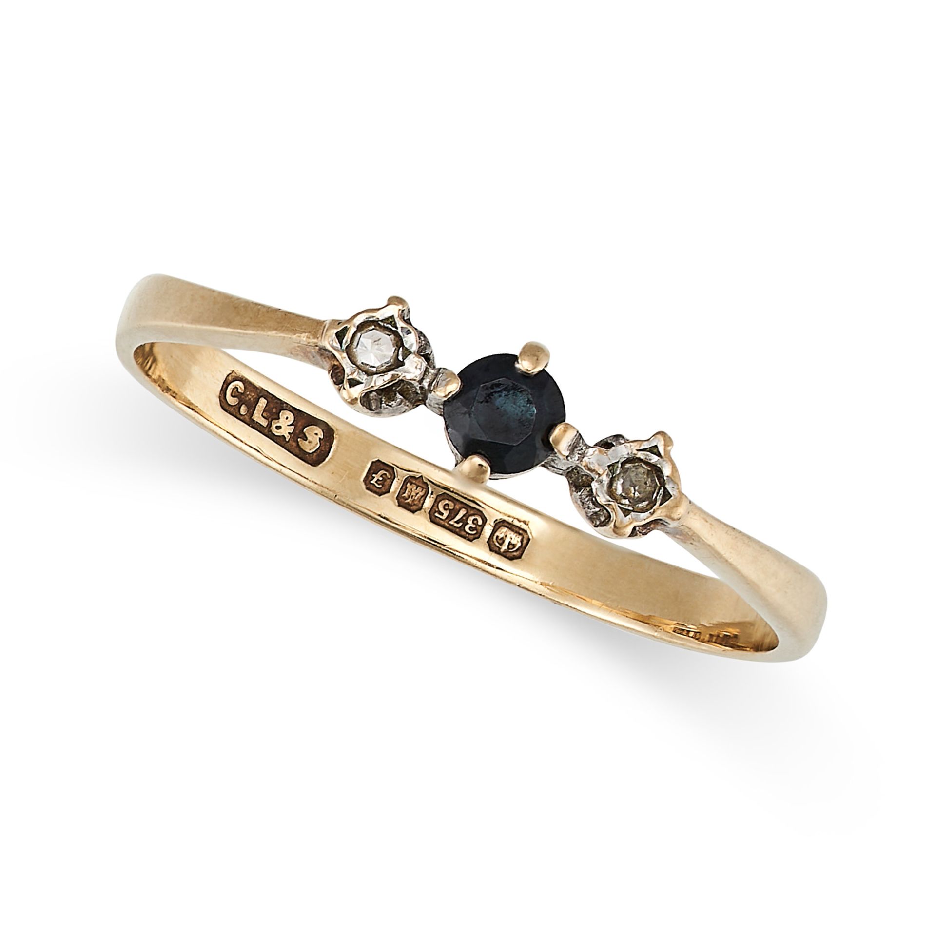 A SAPPHIRE AND DIAMOND THREE STONE RING in 9ct yellow gold, with a round cut sapphire accented by...