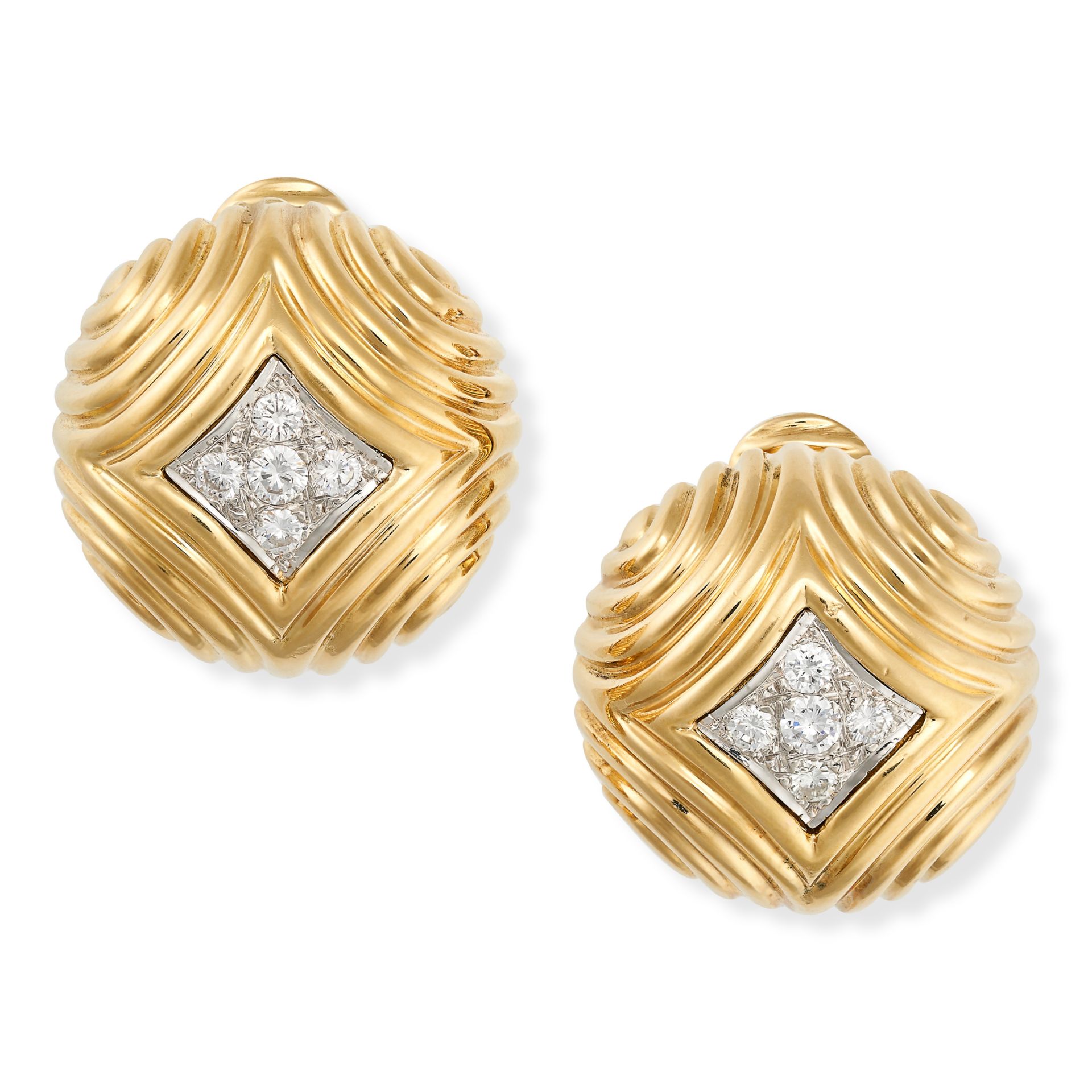 VAN CLEEF & ARPELS, A PAIR OF DIAMOND CLIP EARRINGS in 18ct yellow gold, each designed as a reeded