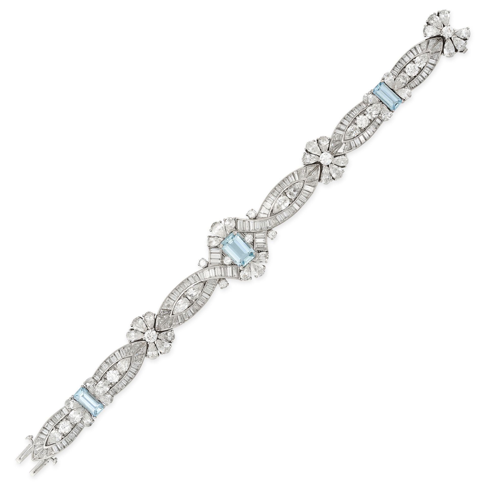 A FINE AQUAMARINE AND DIAMOND BRACELET in platinum, set with a trio of graduated step cut