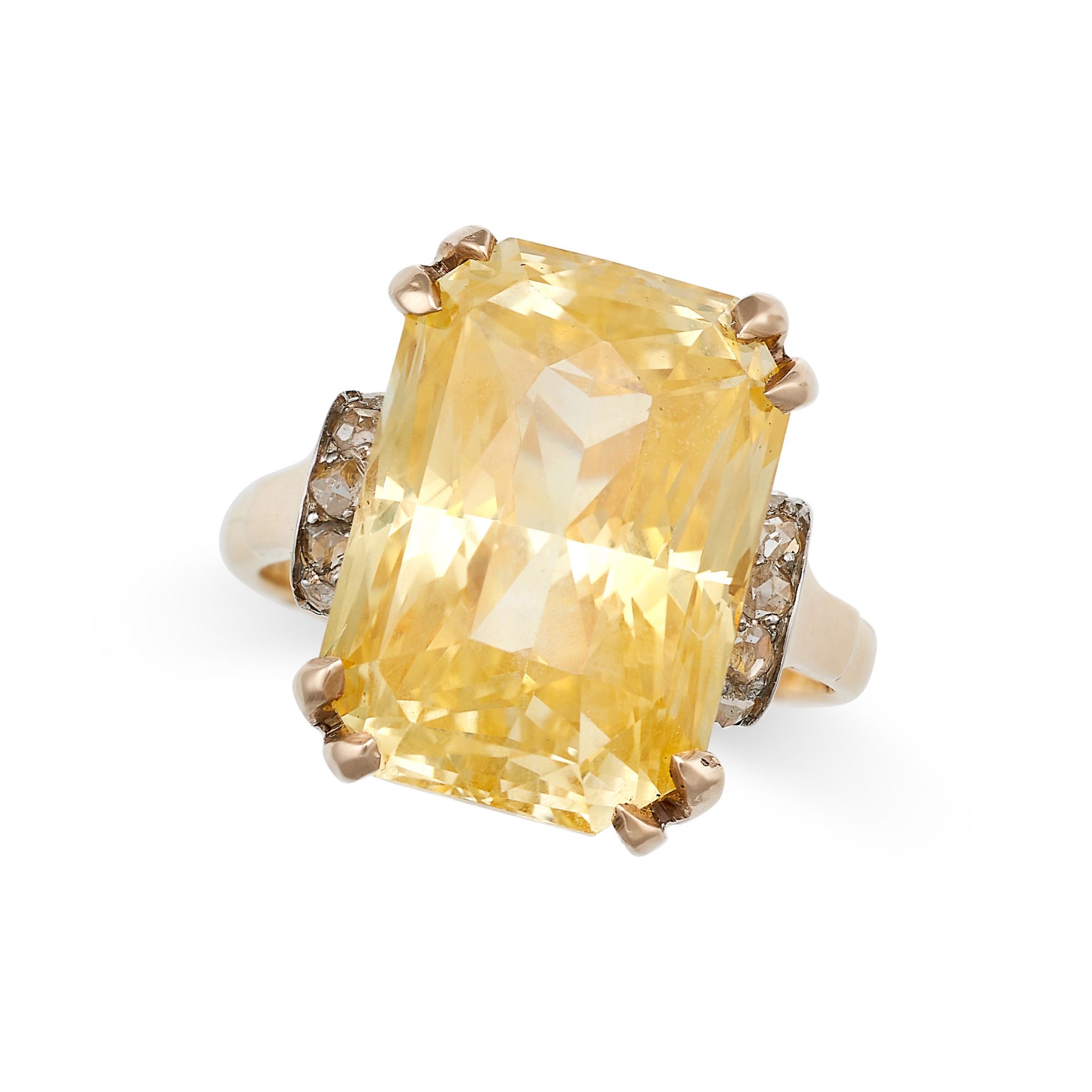 A CEYLON NO HEAT YELLOW SAPPHIRE AND DIAMOND RING in yellow gold set with an octagonal mixed cut