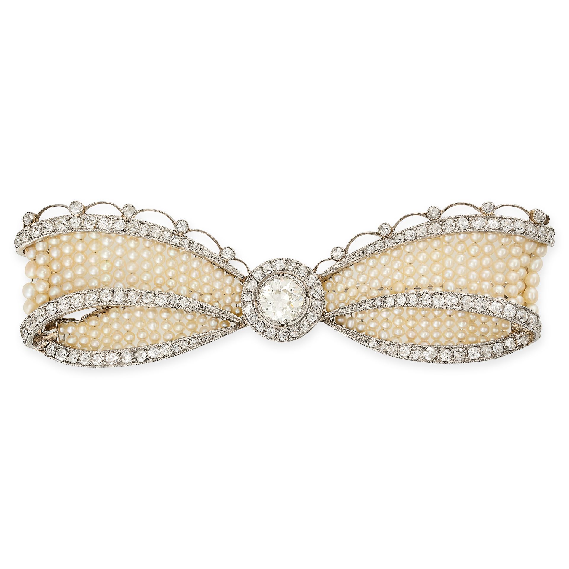 CARTIER, A BELLE EPOQUE PEARL AND DIAMOND BOW BROOCH, EARLY 20TH CENTURY designed as a ribbon tied