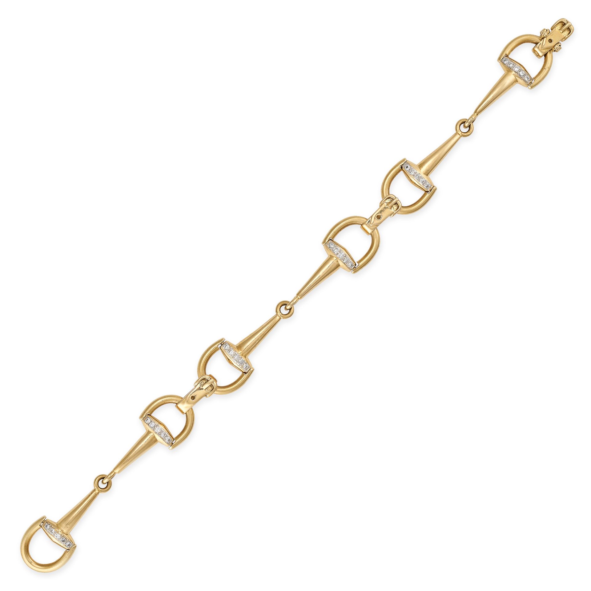 A DIAMOND FANCY LINK BRACELET in 18ct yellow gold, designed as three horse bit links connected by