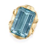 AN AQUAMARINE DRESS RING in 18ct yellow gold, set with an octagonal step cut emerald of