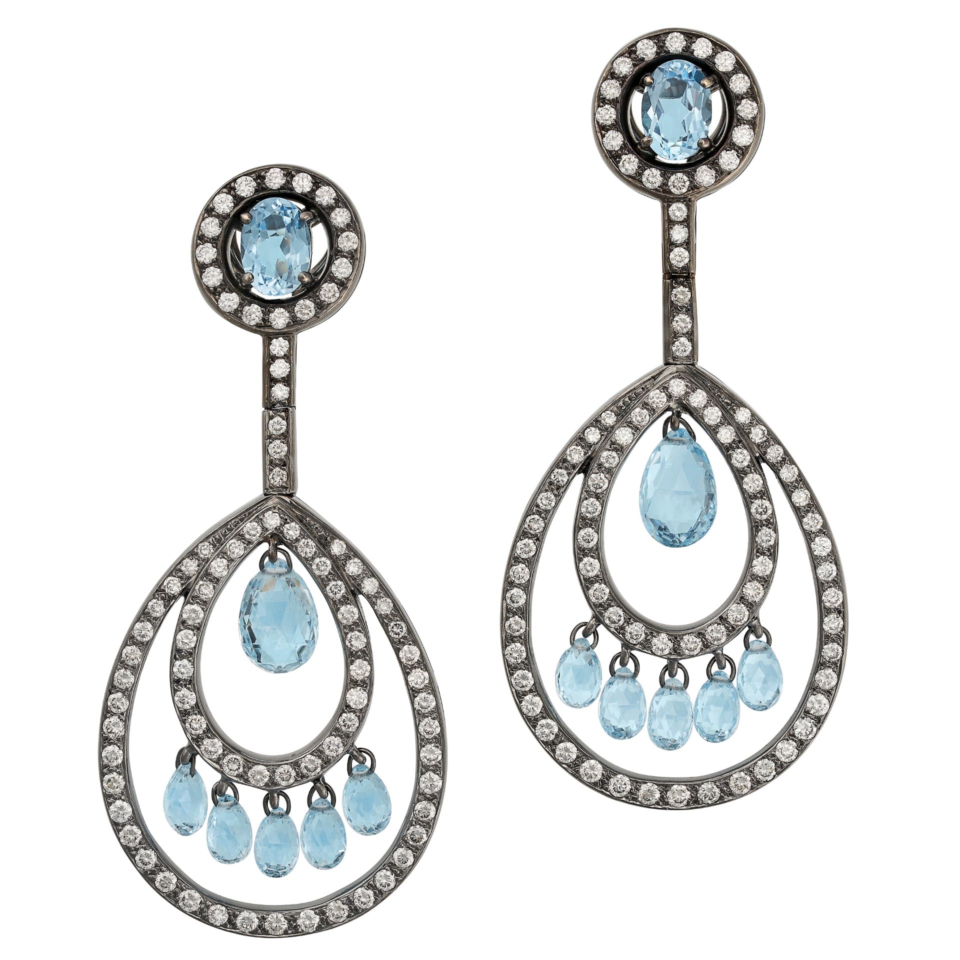 A PAIR OF BLUE TOPAZ AND DIAMOND DROP EARRINGS in blackened gold, each comprising an oval cut blue