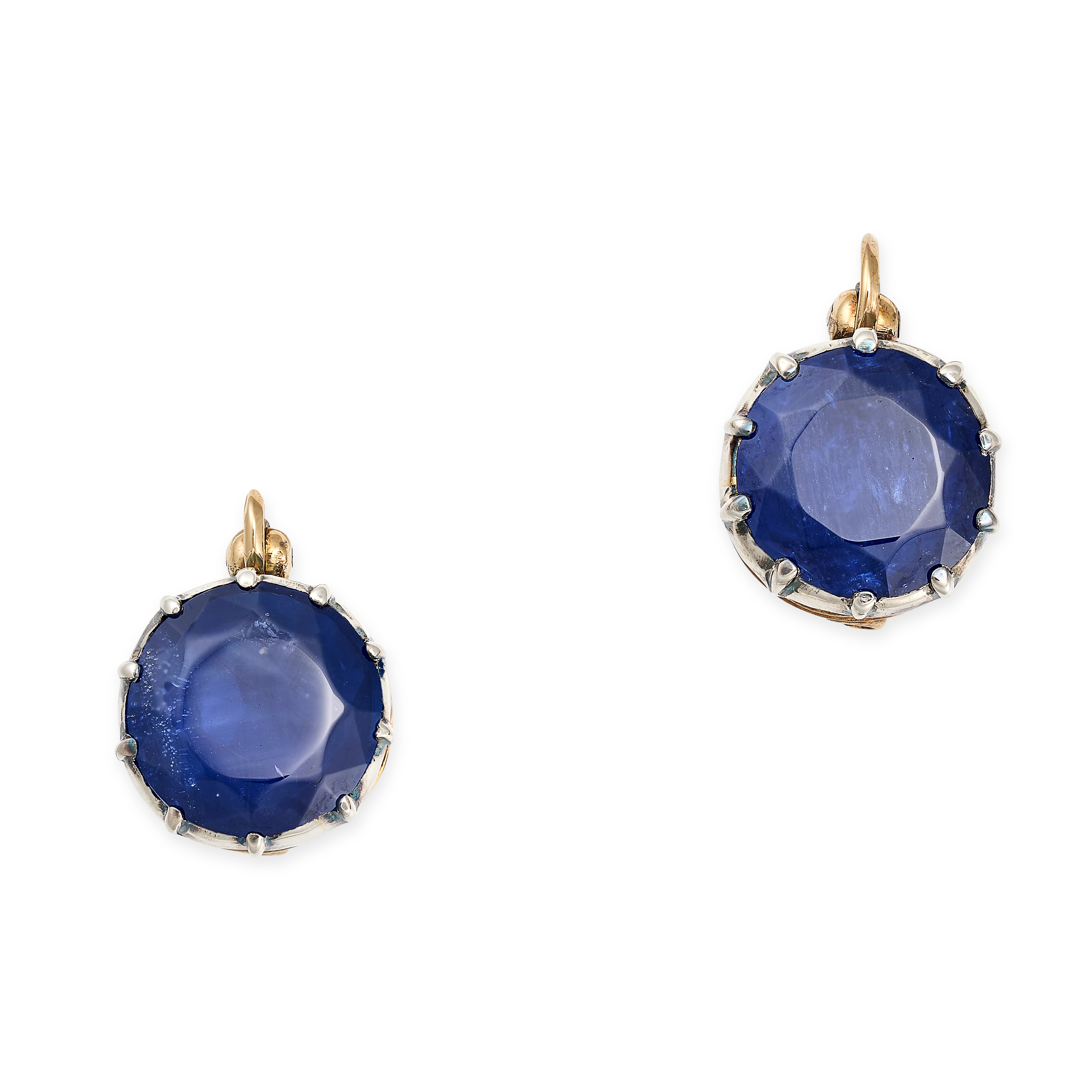 A PAIR OF ANTIQUE SAPPHIRE EARRINGS in yellow gold, each set with a round cut sapphire in a