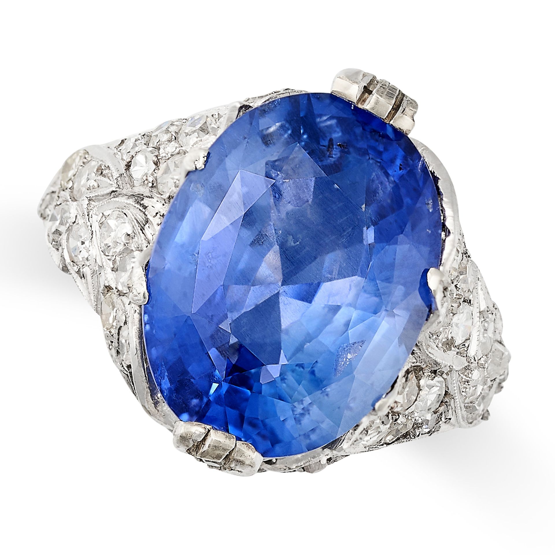 A CEYLON NO HEAT SAPPHIRE AND DIAMOND RING set with an oval cut sapphire of 8.23 carats, the