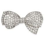 A VINTAGE DIAMOND BOW BROOCH in platinum, designed as a ribbon tied into a bow, set with old cut,