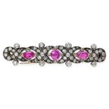 AN ANTIQUE RUBY AND DIAMOND BAR BROOCH in yellow gold and silver, set with three cushion cut