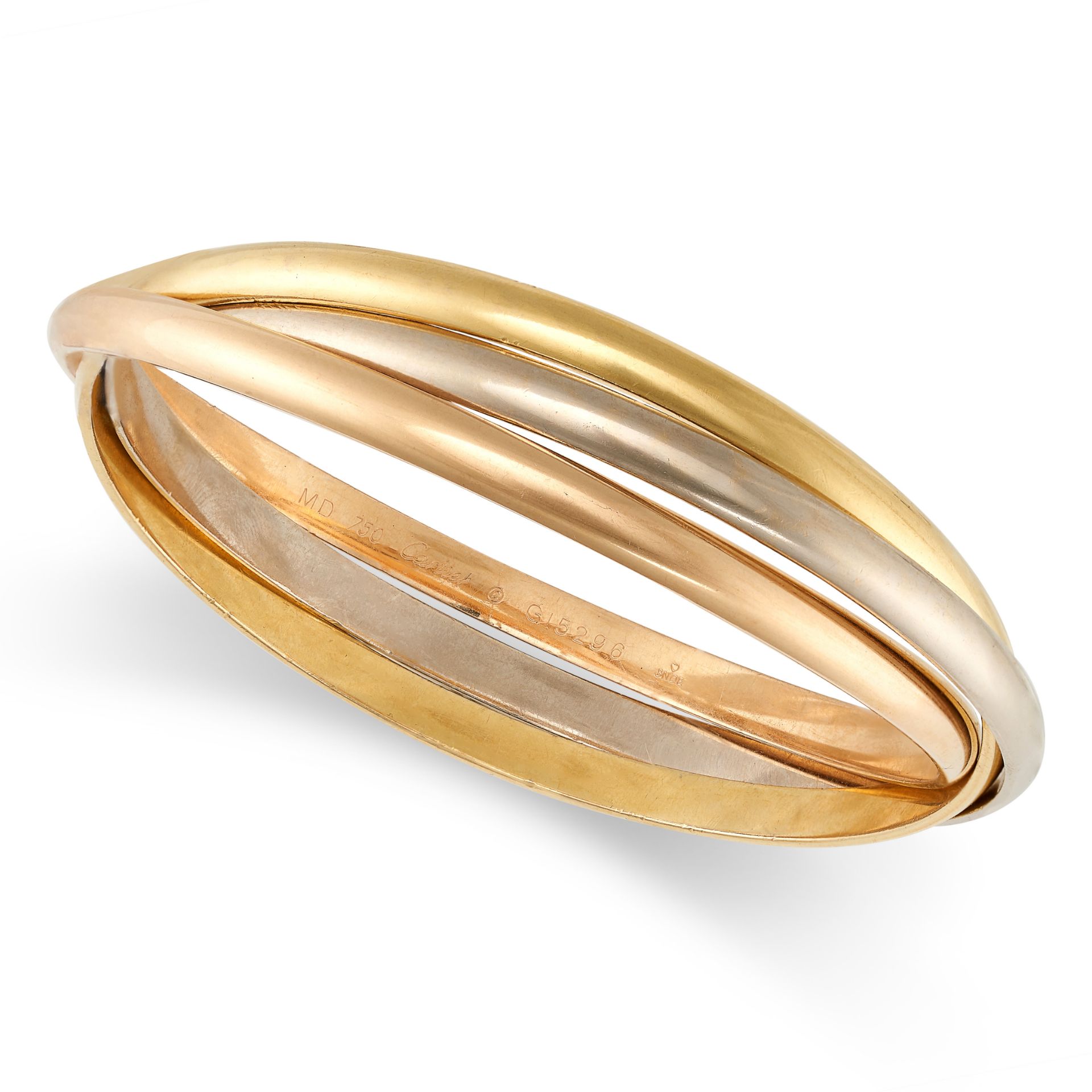 CARTIER, A TRINITY BANGLE in 18ct yellow, rose, and white gold, modelled as three interlocking