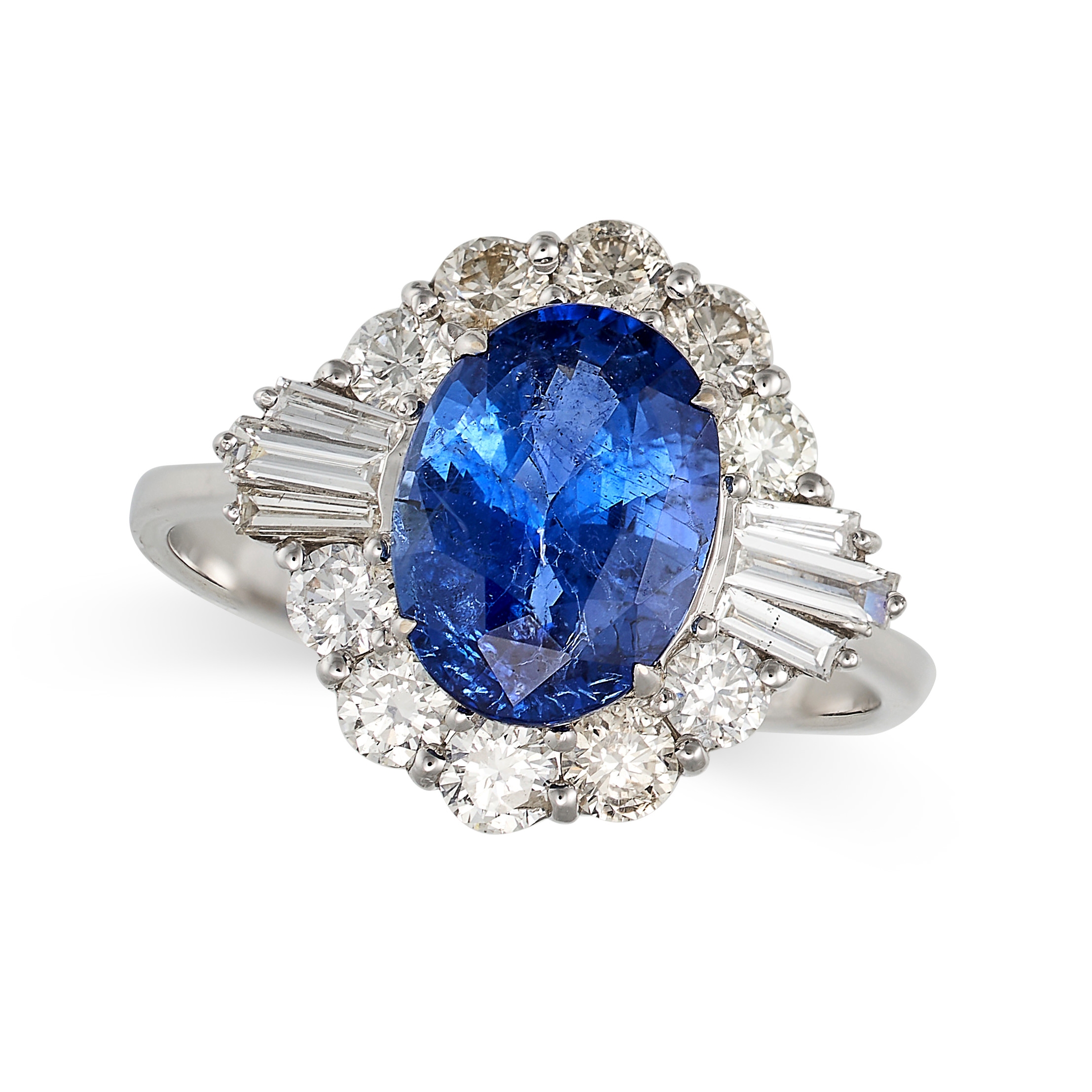 A SAPPHIRE AND DIAMOND CLUSTER RING in 18ct white gold, set with an oval cut sapphire of 2.84 carats