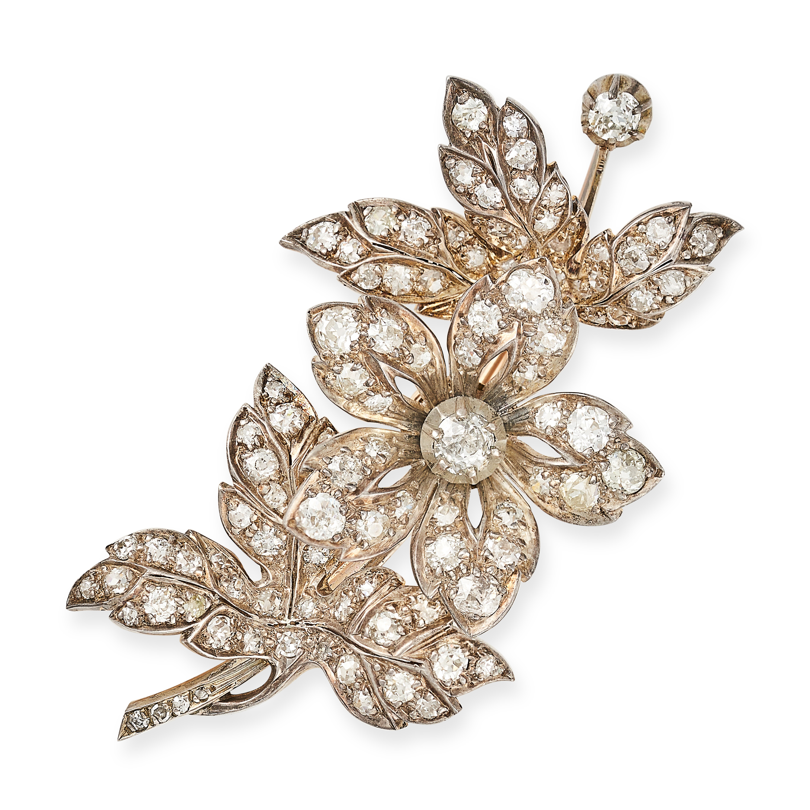 AN ANTIQUE DIAMOND FLOWER BROOCH in yellow gold and silver, set with old cut and single cut diamo...