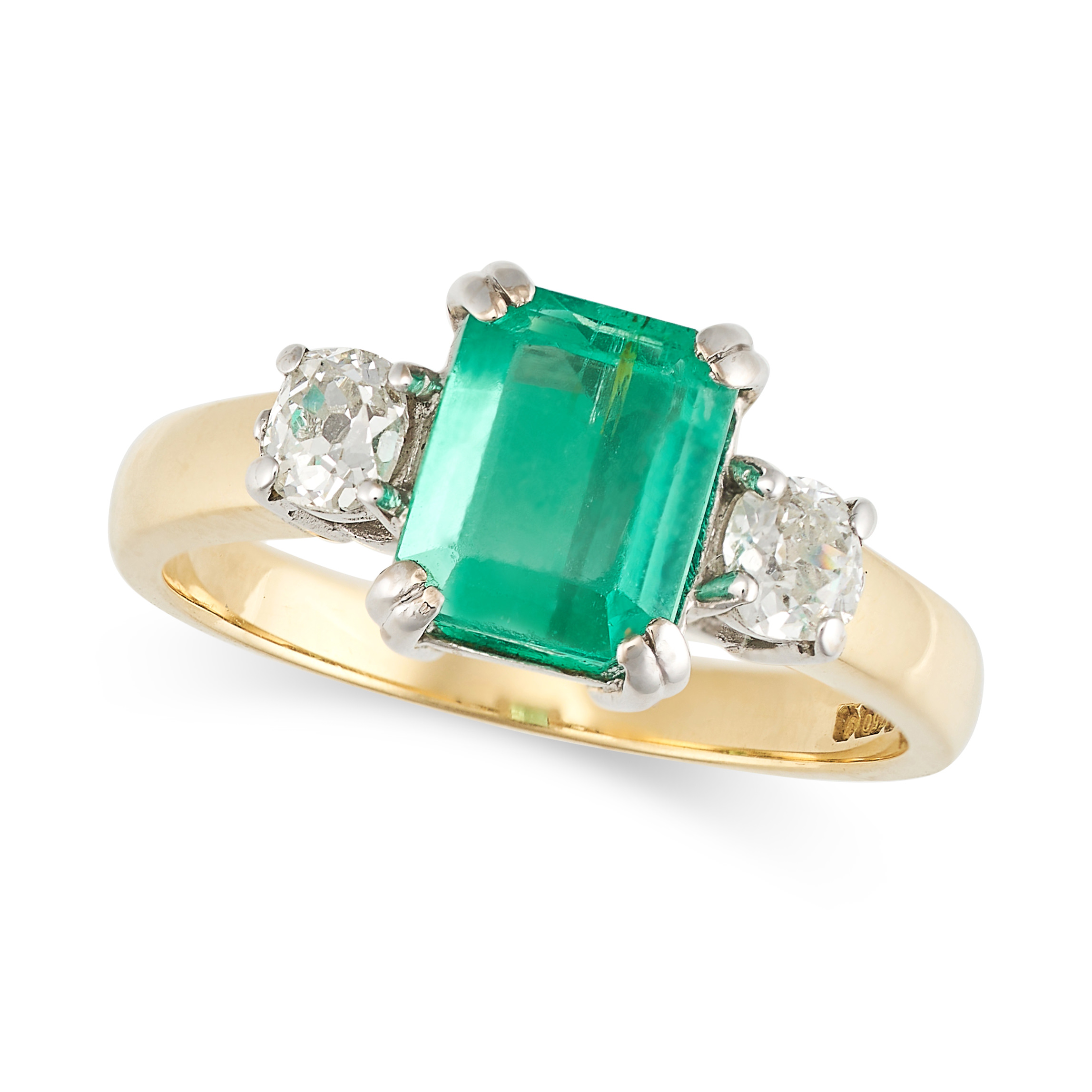 AN EMERALD AND DIAMOND RING in 18ct yellow gold, set with an octagonal cut emerald of approximate...