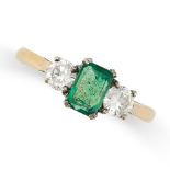 AN EMERALD AND DIAMOND THREE STONE RING in 18ct yellow gold, set with a rectangular step cut emer...