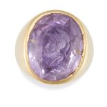 A VINTAGE AMETHYST INTAGLIO RING in 18ct yellow gold, set with an oval cut amethyst intaglio depi...