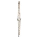 UNIVERSAL GENEVE, A LADIES COCKTAIL WATCH the oval watch face set with a border of round brillian...