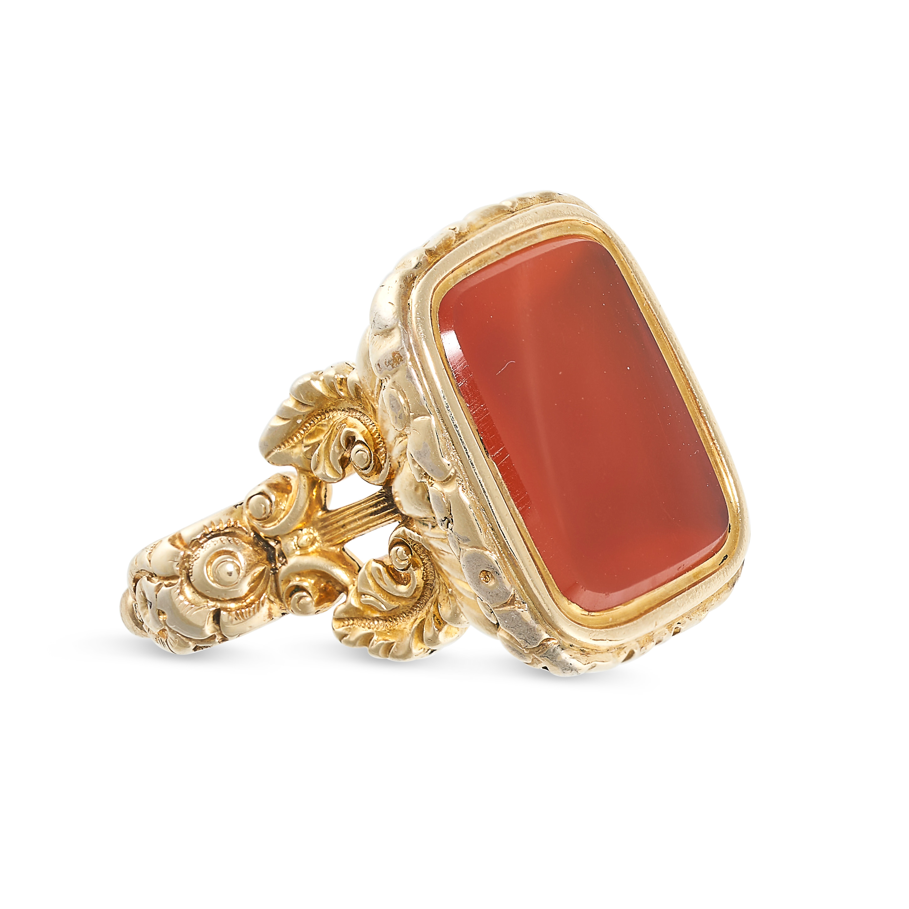AN ANTIQUE CARNELIAN FOB PENDANT in yellow gold, set with a piece of polished carnelian set to a ...