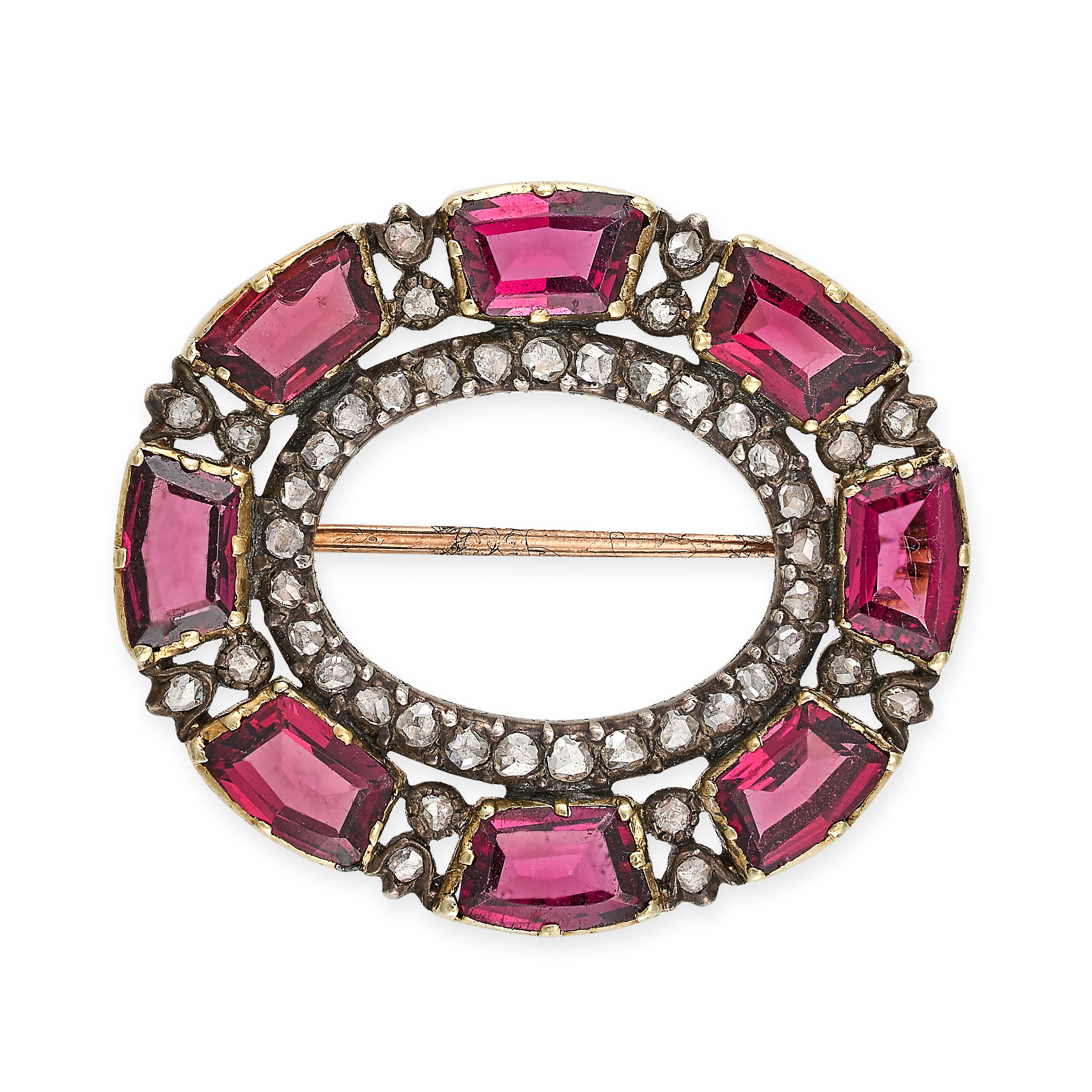 AN ANTIQUE GARNET AND DIAMOND BROOCH in yellow gold and silver, designed as an open oval set with...