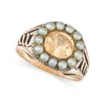 AN ANTIQUE IMPERIAL TOPAZ AND PEARL RING in yellow gold, the ring set with an oval cut imperial t...