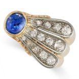 A RETRO SAPPHIRE AND DIAMOND RING in yellow gold, set with an oval cabochon sapphire, accented by...