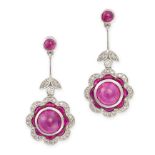 A PAIR OF RUBY AND DIAMOND DROP EARRINGS in platinum, each earring set with a cabochon cut ruby s...