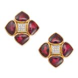 ANTONINI, A PAIR OF GARNET AND DIAMOND CLIP EARRINGS in 18ct yellow gold, each comprising a clust...