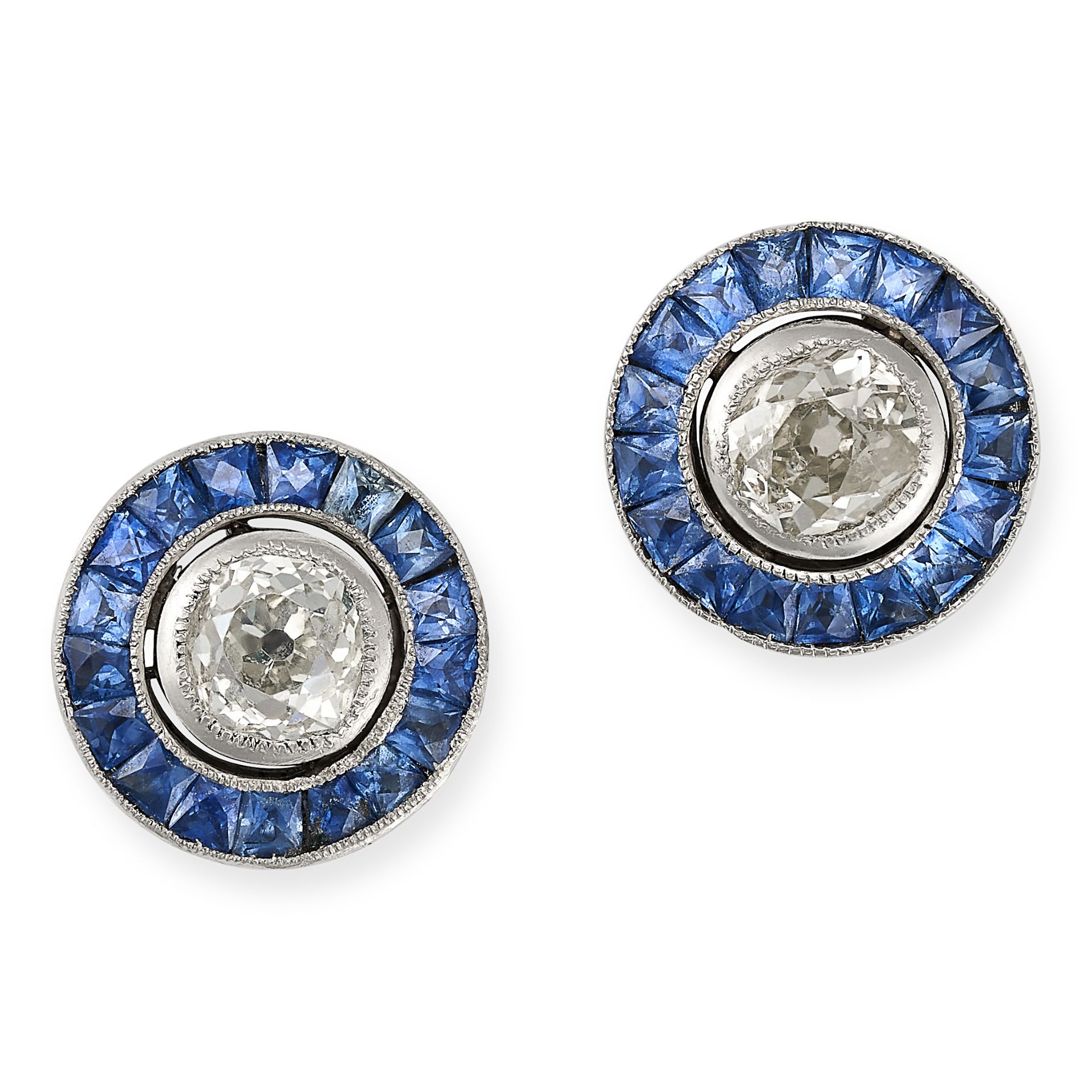 A PAIR OF SAPPHIRE AND DIAMOND TARGET EARRINGS in platinum, each set with an old cut diamond of a...