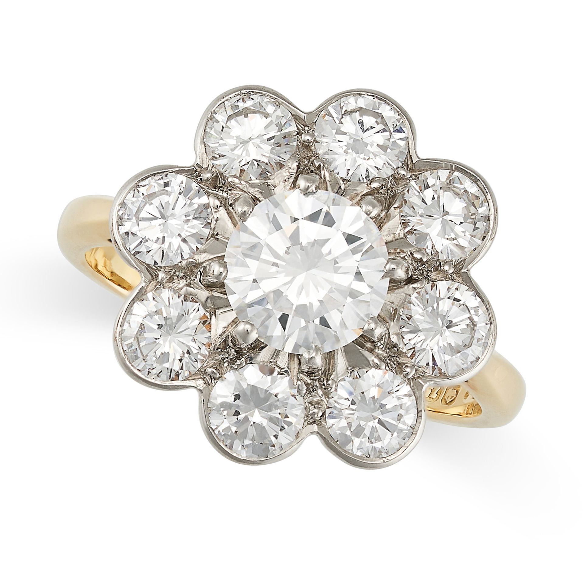 A VINTAGE DIAMOND CLUSTER RING in 18ct yellow gold, set with a cluster of round brilliant cut dia...