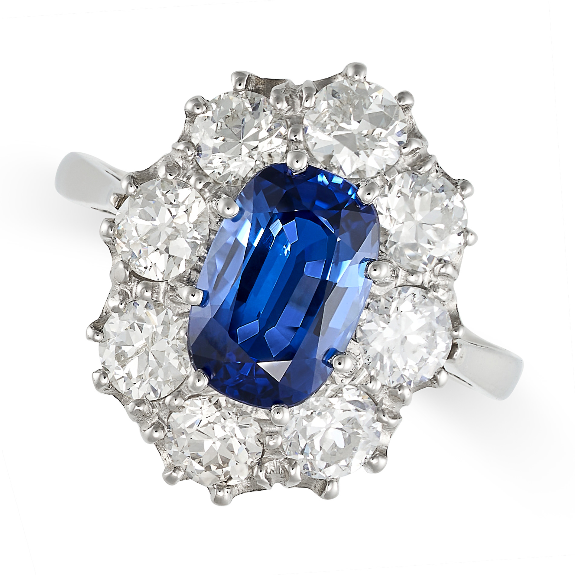 A SAPPHIRE AND DIAMOND CLUSTER RING in platinum, set with a cushion cut sapphire of approximately... - Image 2 of 2