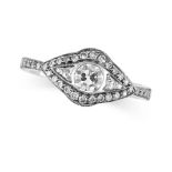 A DIAMOND RING in platinum, set with an old cut diamond of 0.61 carats, accented by round cut dia...
