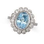 AN AQUAMARINE AND DIAMOND CLUSTER RING in white gold, set with an oval cut aquamarine of approxim...