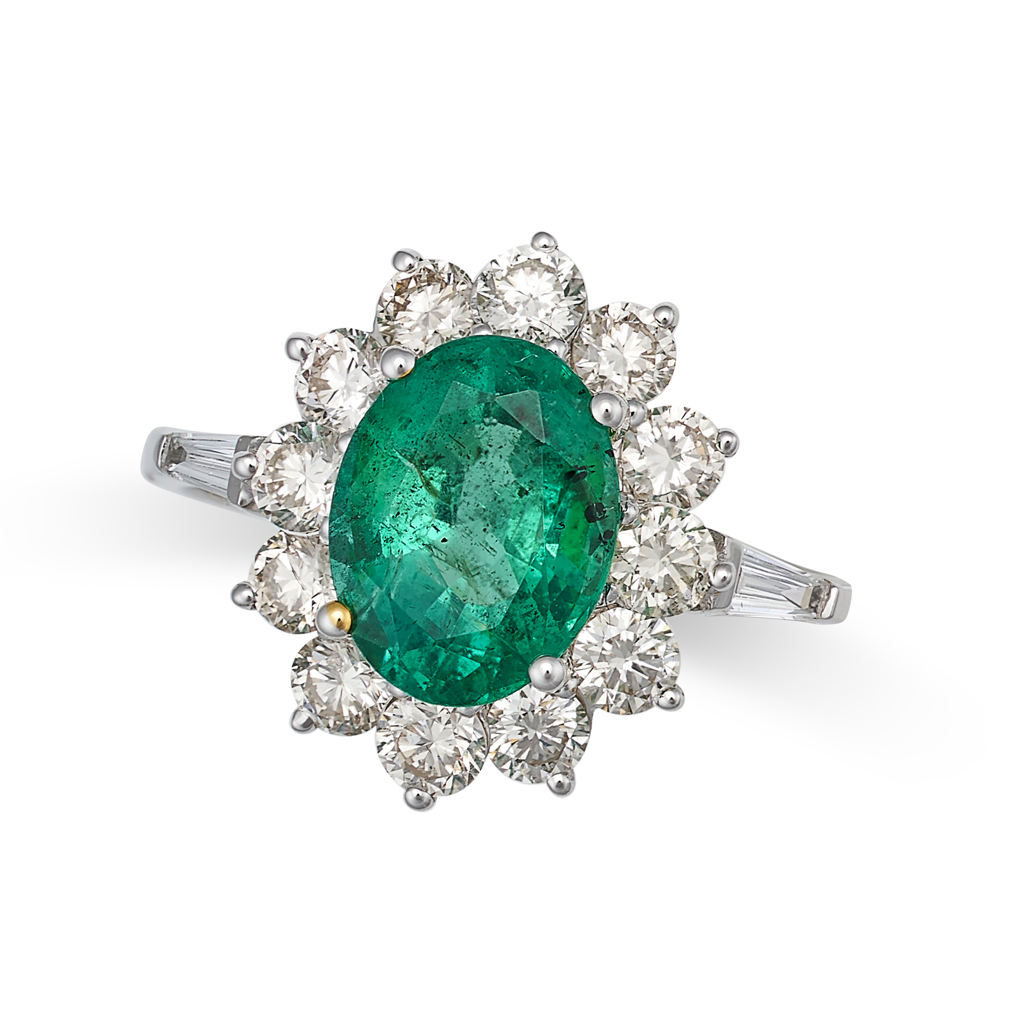 AN EMERALD AND DIAMOND DRESS RING in 18ct white gold, set with an oval cut emerald of 1.74 carats...