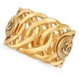 CHANEL, A VINTAGE CC CUFF BANGLE formed of interlocking openwork links with three applied medalli...