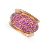 A VINTAGE PORTUGUESE RUBY BOMBE RING in 18ct rose gold, pave set with round cut rubies totalling ...