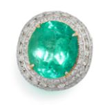 AN EMERALD AND DIAMOND DRESS RING in 18ct white gold, set with an oval cut emerald of 11.66 carat...