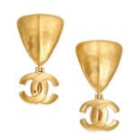 CHANEL, A PAIR OF VINTAGE DROP EAR CLIPS each designed with a CC logo suspending a triangular pla...