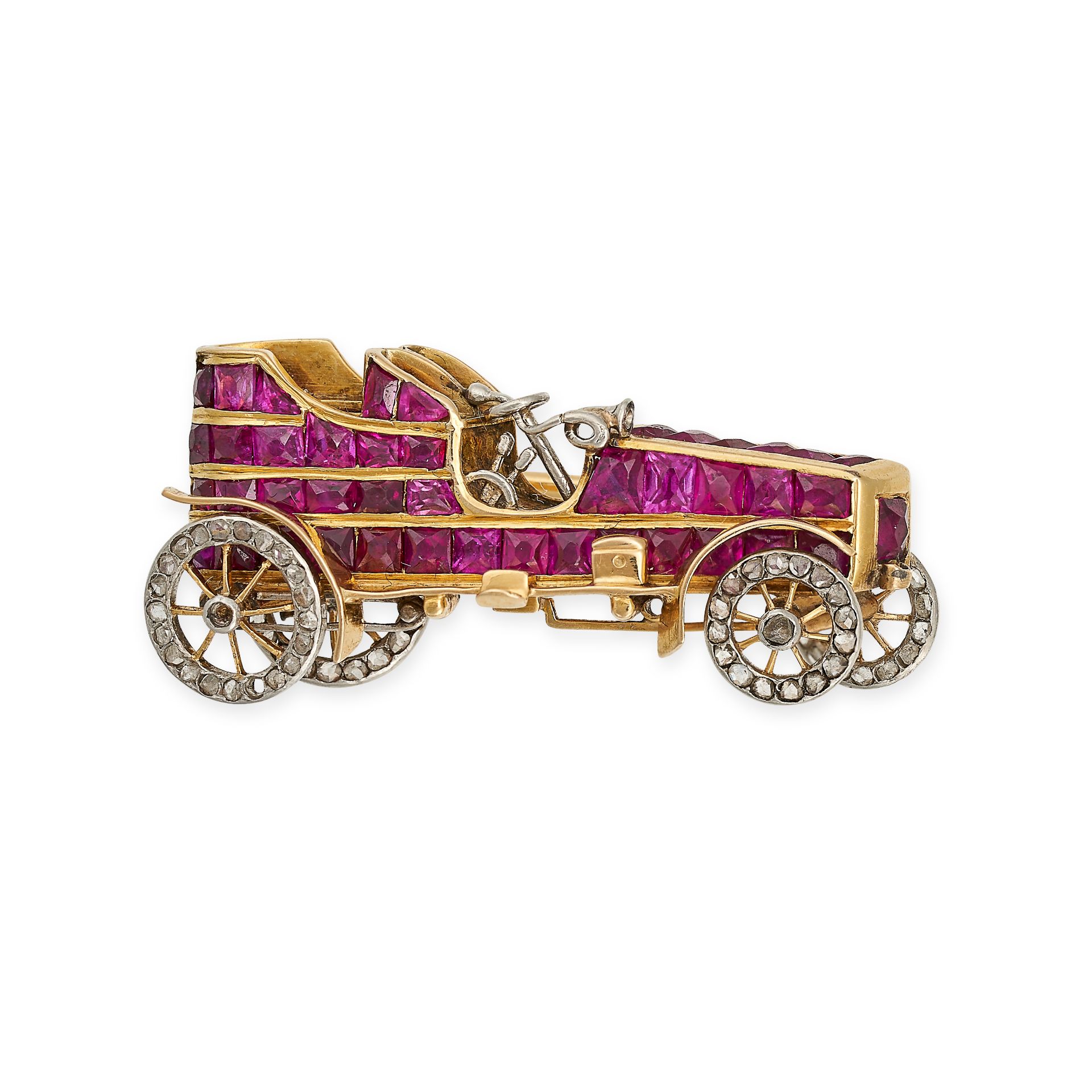 E VANDERHOVE, A RUBY AND DIAMOND CAR BROOCH, EARLY 20TH CENTURY in yellow gold and platinum, desi...