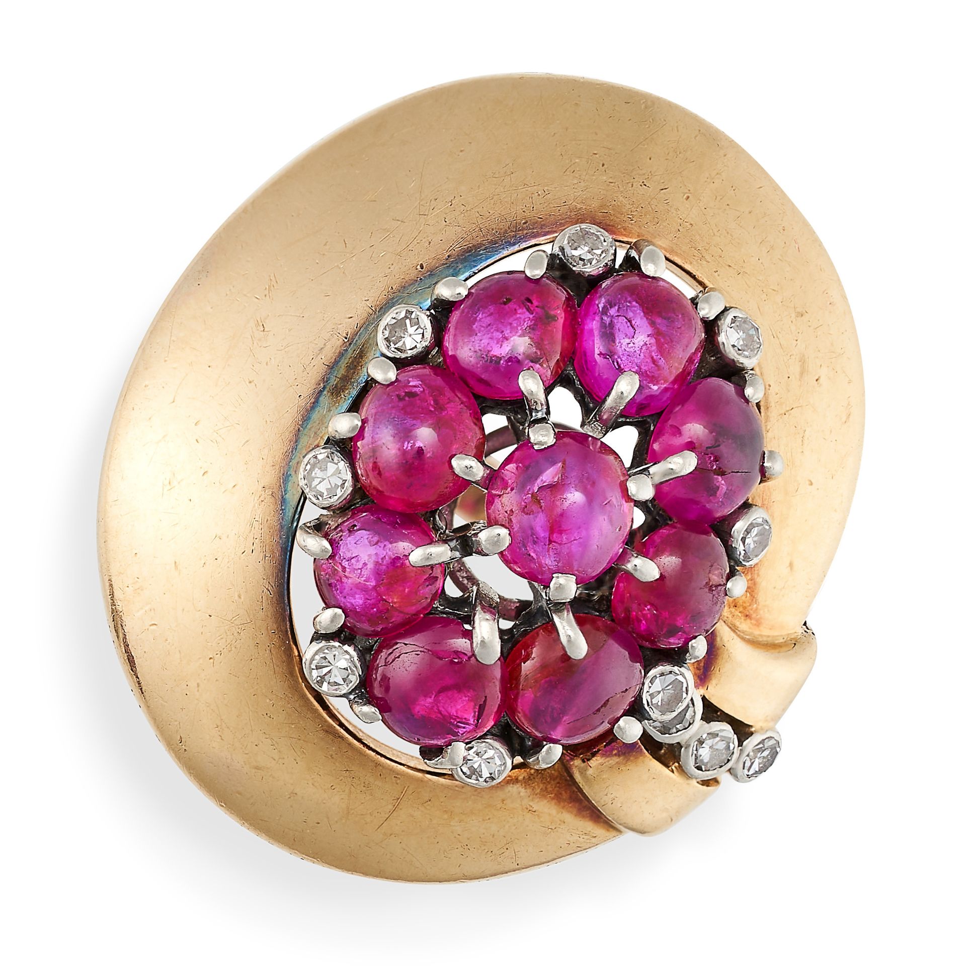 A VINTAGE RUBY AND DIAMOND RING in yellow gold, the oval face set with a cluster of cabochon rubi...
