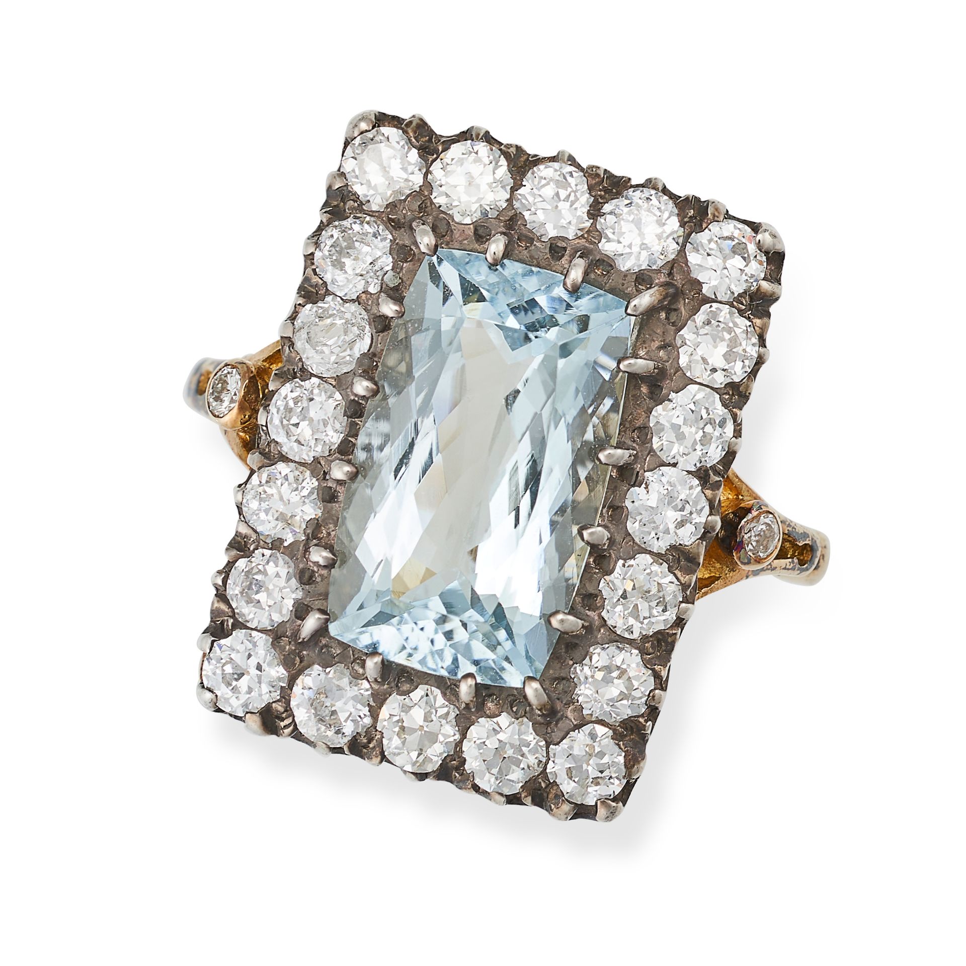 AN AQUAMARINE AND DIAMOND CLUSTER RING in 18ct yellow gold, set with an elongated cushion cut aqu...