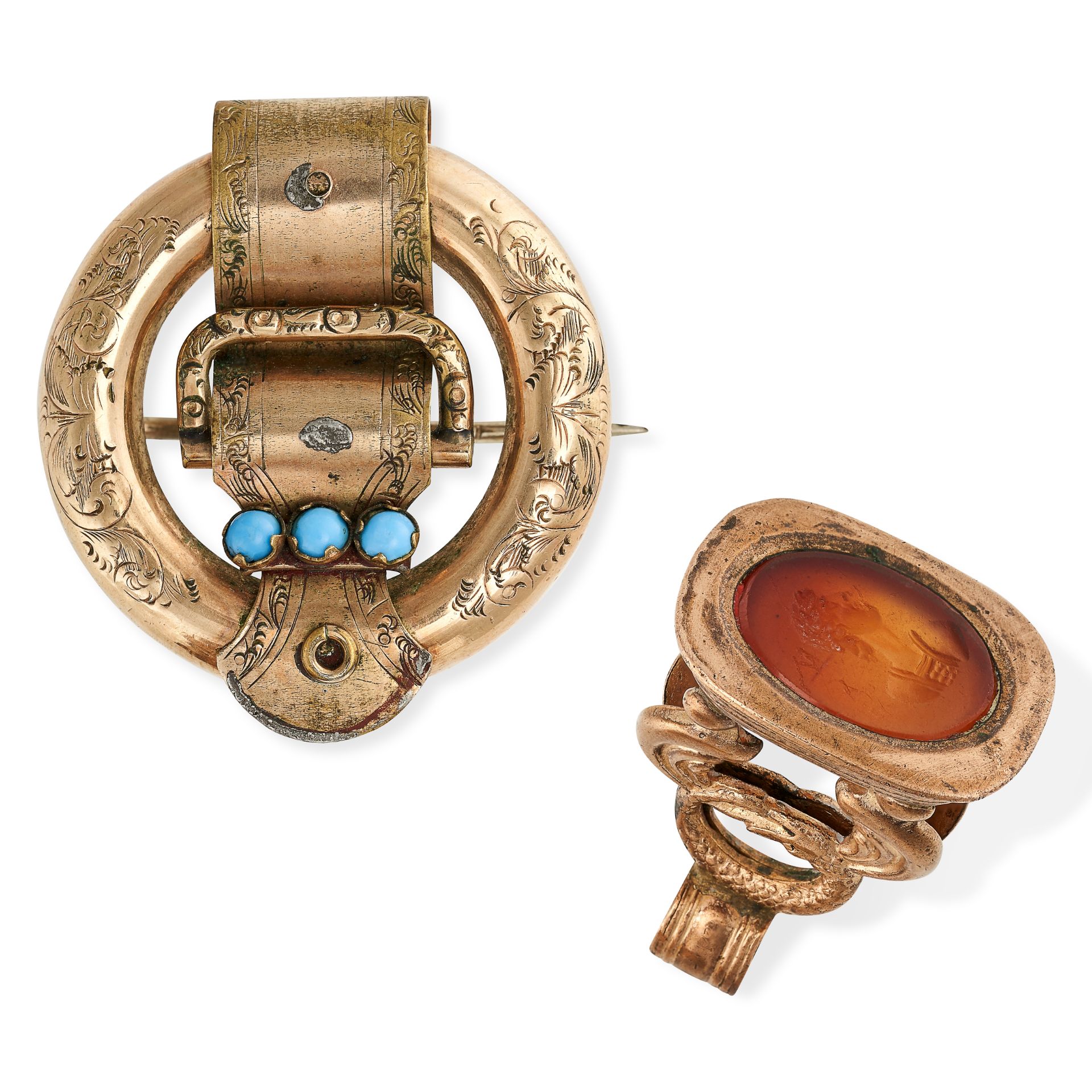 AN ANTIQUE CARNELIAN SEAL AND A BELT BROOCH the seal with an engraved classical figure set to a f...