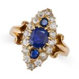 AN ANTIQUE VICTORIAN SAPPHIRE AND DIAMOND RING in yellow gold, the navette face set with three cu...
