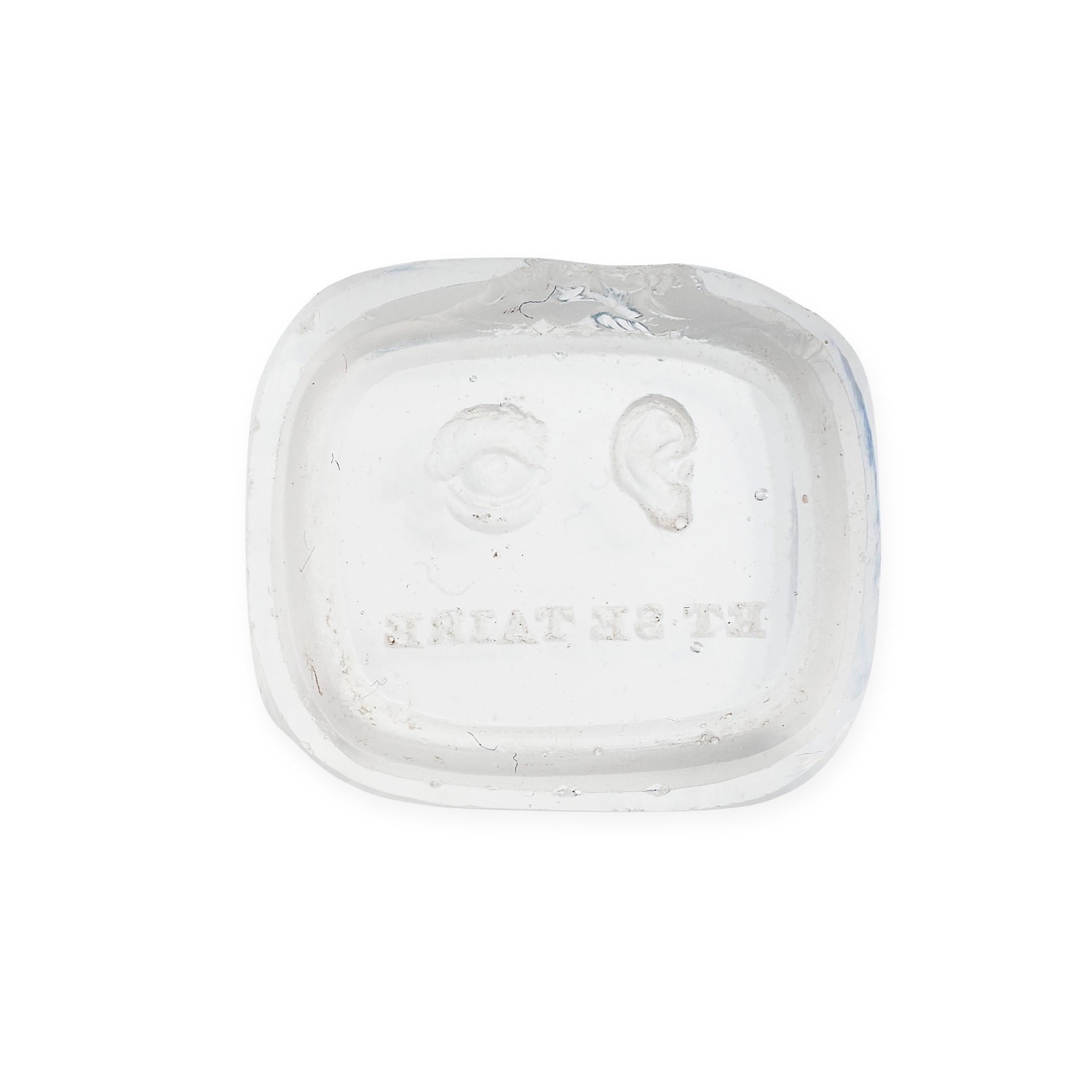 A MODERN MOULDED GLASS SEAL cast from an intaglio, the cushion shaped moulded colourless glass...